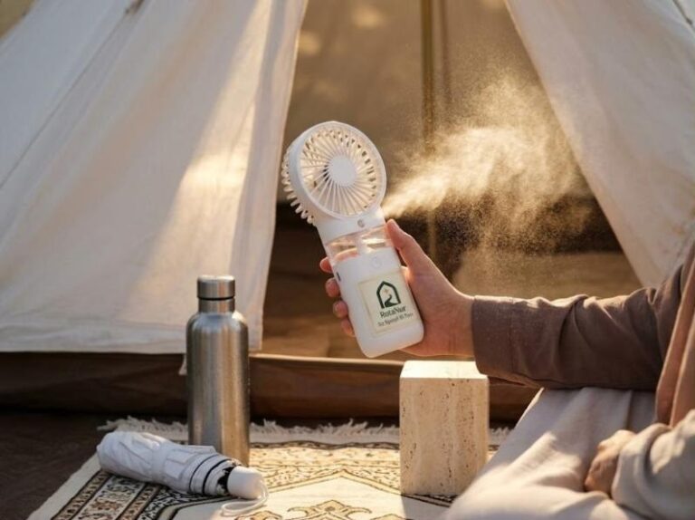 White rechargeable handheld fan with water spray, RotaNur label